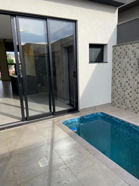 Casa térrea 03 dormitórios e piscina para venda no condomínio Valência